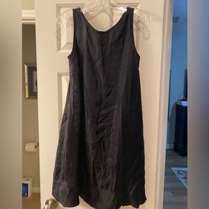 Black trapeze dress with pockets